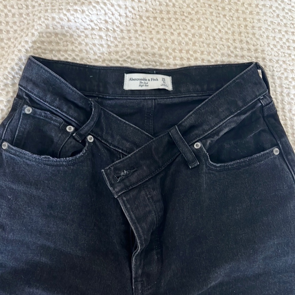 Black abercrombie asymmetrical jeans